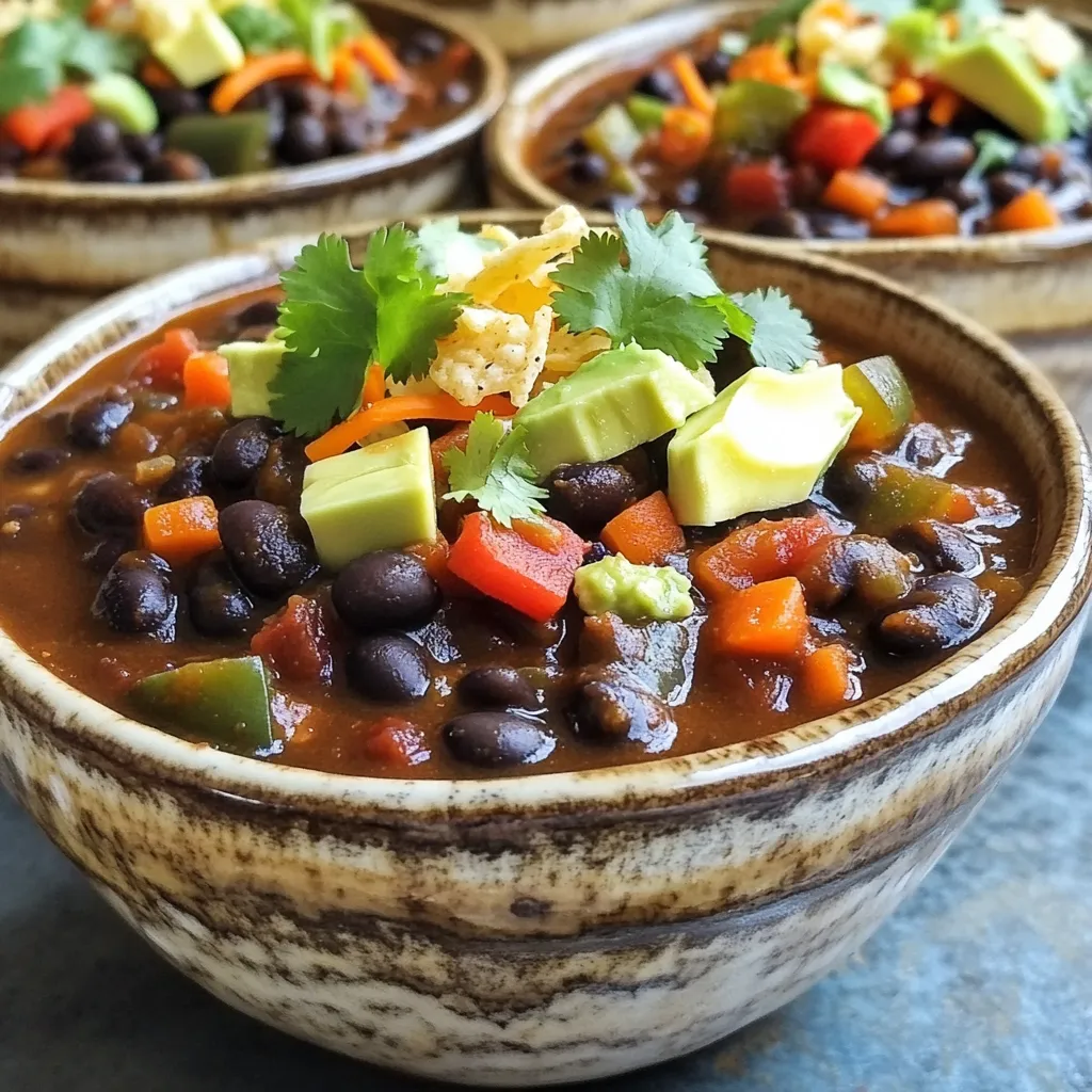 For my Slow Cooker Chipotle Black Bean Chili, I use a mix of fresh and hearty ingredients. Each adds great taste and texture. Here’s what you need: - 2 cups dried black beans, rinsed and soaked overnight - 1 large onion, diced - 4 cloves garlic, minced - 2 medium bell peppers (red and green), diced - 2 medium carrots, diced - 1 can (14 oz) diced tomatoes (with juices) - 2 cups vegetable broth - 2-3 chipotle peppers in adobo sauce, minced (adjust to taste) - 2 teaspoons ground cumin - 1 teaspoon smoked paprika - 1 teaspoon dried oregano - 1 tablespoon olive oil - Salt and pepper to taste - Fresh cilantro, for garnish - Avocado, diced (for serving) - Crumbled tortilla chips (for topping) Using dried black beans gives the chili a rich flavor. Soaking them overnight makes them tender. I love using onion and garlic for a strong base. Bell peppers add sweetness, while carrots bring extra crunch. The diced tomatoes add moisture, and vegetable broth ties it all together. Chipotle peppers add a smoky kick, but you can adjust the heat. Cumin, smoked paprika, and oregano are the key spices. Olive oil helps sauté the veggies and adds richness. Finally, garnishes like cilantro and avocado make each bowl pop. Crumbled tortilla chips add the perfect crunch. This mix of ingredients makes my chili a true delight. - Sautéing the onion and garlic First, I heat olive oil in a large skillet over medium heat. I add the diced onion and minced garlic. I sauté them for about 3-4 minutes until they soften and smell great. - Adding bell peppers and carrots Next, I toss in the diced bell peppers and carrots. I continue to sauté these veggies for about 5 minutes. They should start to soften but still hold some shape. - Transferring to the slow cooker Once the veggies are ready, I transfer them to the slow cooker. This is where all the magic happens! - Combining all ingredients in the slow cooker Now, I add the soaked black beans, canned diced tomatoes with their juices, and vegetable broth to the slow cooker. I also throw in the minced chipotle peppers, ground cumin, smoked paprika, and dried oregano. I stir everything well to mix. - Cooking times and settings I cover the slow cooker and set it to cook. For a slower cook, I choose low for 6-8 hours. If I need it done faster, I set it on high for 3-4 hours. The beans should be soft and the chili thick. - Adjusting texture and seasoning When the chili is done, I stir it well. If I want a creamier texture, I use a potato masher to mash some beans against the pot's side. I check the seasoning and add salt and pepper if needed. - Serving suggestions I love to serve this chili hot. I garnish it with fresh cilantro and diced avocado. I also sprinkle crumbled tortilla chips on top for crunch. A lime wedge on the side adds a nice zing! To make your chili pop, try adding more spices. You can include extra cumin or smoked paprika. If you want more heat, add more chipotle peppers. Start with one extra and taste as you go. This way, you control the spice level. Everyone has different heat levels, so make it your own. A slow cooker makes this chili easy. It allows the flavors to blend well. Stovetop cooking is faster but may not develop the same depth. If you choose stovetop, stir often and watch closely. Soaking beans is key. It helps them cook evenly and makes them soft. You can skip soaking, but the texture may change. So, soak them overnight for best results. Serve your chili in nice bowls. Top each bowl with fresh cilantro and diced avocado. Crumbled tortilla chips add a nice crunch. You can also serve with warm bread or cornbread on the side. A lime wedge adds a zesty touch. This makes your dish look great and taste even better! {{image_2}} You can swap out beans in this chili. Try pinto, kidney, or navy beans. Each type has its own taste. Mixing beans can add fun flavors and textures. If you want a vegan version, skip the meat and use more veggies. You can add mushrooms or lentils for protein. Adding corn or zucchini can boost the chili's flavor. Sweet corn gives a nice crunch. Zucchini adds a soft texture and absorbs spices well. You can also change the broth. Use chicken broth or tomato juice for a new taste. Each liquid adds its own unique touch to the dish. You can serve chili in tacos or burritos. Just scoop some chili into a tortilla for a tasty wrap. It’s fun to eat and great for sharing. Another idea is to serve it over rice or quinoa. This makes a hearty meal. Both grains soak up the chili's flavors and keep you full. To keep your chili fresh, use airtight containers. Glass or plastic containers work well. Make sure you cool the chili before sealing it. This helps avoid moisture buildup. Store leftovers in the fridge for up to four days. If you want to keep it longer, freeze the chili. Divide it into portions for easy use later. Use freezer-safe bags or containers for best results. For the best taste, reheat your chili on the stove. Heat it in a pot over medium heat. Stir it often to prevent sticking. This usually takes about 10-15 minutes. If you are in a hurry, you can use a microwave. Place your chili in a microwave-safe bowl. Heat in 1-minute intervals, stirring in between. It should be hot after about 3-5 minutes. In the fridge, your chili can last about four days. If you freeze it, it can last up to three months. Always check for signs of spoilage. If it smells sour or has a strange color, don’t eat it. Look for mold or any off-putting texture. Trust your senses; they are a good guide for food safety. You can skip soaking the black beans, but I don’t recommend it. Soaking helps them cook evenly. If you skip it, the beans may take longer to cook. You may also want to add extra broth. To make your chili spicier, add more chipotle peppers. You can also use cayenne pepper or hot sauce. Start with a little and taste as you go. This way, you control the heat level. If you don’t have chipotle peppers, use smoked paprika for a milder flavor. You can also use jalapeños for heat. Keep in mind that each option will change the taste a bit. Yes, this chili is gluten-free. All the ingredients are safe for those who avoid gluten. Just check your vegetable broth to make sure it’s gluten-free. Store leftover chili in an airtight container. You can keep it in the fridge for about 5 days. For longer storage, freeze it for up to 3 months. Just thaw before reheating. This chili recipe is packed with flavor and easy to make. You learned the key ingredients, preparation steps, and cooking methods. Remember to customize it with your favorite beans and spices. Enjoy it with tasty garnishes, and don’t forget the storage tips for leftovers! Whether you choose a slow cooker or stovetop, this dish is versatile and satisfying. With the right tweaks, you can make it your own. Try it out and impress family and friends with your cooking skills!