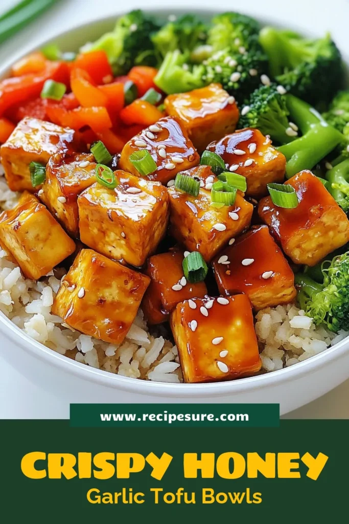 Discover the deliciousness of Honey Garlic Tofu Bowls with this easy tofu bowl recipe! This crispy tofu recipe features a flavorful vegan honey garlic sauce, making it a satisfying healthy Asian bowl recipe. Perfect for meal prep and packed with veggies, it's sure to impress. Ready in just 30 minutes, it's a must-try! Save this recipe for a quick weeknight dinner. #HoneyGarlicTofu #TofuBowlRecipe #CrispyTofu #HealthyAsianBowl