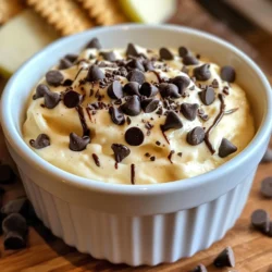 To make this tasty dip, you need some key ingredients. Each one adds to the flavor and texture. Here’s what you’ll need: - 1 cup all-purpose flour - 1 cup cream cheese, softened - 1/2 cup unsalted butter, softened - 1/2 cup brown sugar, packed - 1/2 cup granulated sugar - 1 teaspoon vanilla extract - 1/4 teaspoon salt - 1/2 cup mini chocolate chips These basic items create a rich, creamy dip that tastes like cookie dough. The cream cheese and butter make it smooth. The sugars add sweetness, while the flour gives it body. If you want to kick up the flavor, consider some optional add-ins. Here are a few ideas: - 1/4 cup crushed walnuts or pecans - A pinch of cinnamon - A splash of almond extract Adding nuts gives a nice crunch. Cinnamon or almond extract can add a warm or nutty twist. Feel free to play around and find your favorite mix! When it's time to serve the dip, think about what to use for dipping. Here are some tasty options: - Graham crackers - Pretzels - Apple slices - Cookies These dippers pair well with the sweet dip. You can use sweet or salty dippers, depending on your taste. Enjoy exploring different combinations! {{ingredient_image_1}} To start, gather your ingredients. You need flour, cream cheese, butter, and sugar. In a large bowl, mix the softened cream cheese and unsalted butter. Use a hand mixer or stand mixer on medium speed. Beat until it is creamy. Next, add the brown sugar and granulated sugar. Mix it until the mixture is light and fluffy. Now, pour in the vanilla extract and salt. Mix these in until everything combines well. Slowly add the all-purpose flour. Use low speed to keep the flour from flying everywhere. Once mixed, gently fold in the mini chocolate chips. If you like, add crushed walnuts or pecans too. Keep folding until the chips are evenly spread. Once mixed, transfer the dip to a serving bowl. Cover it with plastic wrap. This step is key; you need to chill it in the refrigerator for at least 30 minutes. Chilling helps the flavors blend together. It also firms up the dip, making it easier to scoop. When ready to serve, take the dip out of the fridge. You can serve it cold. A fun way to present it is in a pretty bowl. Drizzle melted chocolate on top for extra flair. Sprinkle some mini chocolate chips around the edges for a nice touch. Serve with dippers like graham crackers, pretzels, apple slices, or cookies. Enjoy this tasty treat with friends or family! To get a super creamy dip, use room temperature cream cheese and butter. This helps them mix well. I suggest beating them together first. Use a hand mixer for best results. Mix until the cream cheese and butter are smooth and fluffy. If you want more creaminess, add a little more butter. Just a tablespoon can make a big difference! Start mixing with the cream cheese and butter. Add sugars slowly. Mix until light and fluffy. Then add the vanilla extract and salt. These add great flavor. When you add the flour, mix on low speed. This keeps the flour from flying everywhere. Finally, gently fold in the mini chocolate chips. This helps keep them whole and evenly spread in the dip. A great-looking dip can make it even more fun! Transfer your dip to a nice bowl. For a fancy touch, drizzle melted chocolate on top. You can also sprinkle extra mini chocolate chips around the edges. This makes the dip look inviting. Serve it with colorful dippers like apple slices or graham crackers. Your friends will love it! Pro Tips Chill for Best Flavor: Allow the dip to chill for at least 30 minutes before serving. This enhances the flavors and makes it even more delicious. Flour Safety: To ensure the flour is safe to eat, consider heating it in the microwave for 1 minute before using it in the recipe. Dipper Variety: Offer a variety of dippers like fruit, cookies, and pretzels to complement the sweetness of the dip and add texture. Make it Your Own: Feel free to customize the dip by adding different mix-ins like shredded coconut, peanut butter, or other types of chocolate chips. {{image_2}} You can easily change the flavor of your cookie dough dip. For a nutty twist, add 1/2 cup of peanut butter. This gives a rich, creamy taste that pairs well with chocolate. If you want something refreshing, try adding mint extract instead of vanilla. Start with 1/2 teaspoon, then adjust to your liking. If you want a healthier dip, you can make a few swaps. Use low-calorie sweeteners instead of brown and granulated sugar. You can also replace all-purpose flour with almond or oat flour for a gluten-free option. This way, you keep the flavor while making it friendlier for certain diets. Seasonal flavors can make your dip extra special. In the fall, add pumpkin spice for a cozy twist. Just mix in 1 teaspoon of pumpkin pie spice with the other ingredients. For winter, you can fold in crushed candy canes for a peppermint crunch. These small changes can bring festive cheer to your dessert table! Store your leftover dip in an airtight container. This keeps it fresh and tasty. You can place it in the fridge for up to five days. Make sure to cover it well to avoid drying out. If you want to enjoy it later, keep the dippers separate. You can freeze this dip for longer storage. Use a freezer-safe container and leave some space at the top. The dip can stay good for about three months in the freezer. When you want to eat it, thaw it in the fridge overnight. To refresh the dip, mix it again after thawing. If it seems too thick, add a bit of cream cheese. You can also mix in more chocolate chips for extra flavor. Enjoy the dip cold or at room temperature. Yes, you can eat the dip without baking. This dip is safe to eat raw. It tastes just like cookie dough. The mix of cream cheese, butter, and sugars gives it a sweet flavor. You can enjoy it right after mixing. The dip lasts about 3 to 5 days in the fridge. Make sure to store it in an airtight container. This keeps it fresh and tasty. If it starts to look or smell off, toss it out. Yes, you can use a different type of flour. Almond flour or oat flour can work well. Just note that it may change the texture a bit. Always check if the flour is safe to eat raw. If you don’t have cream cheese, you can use Greek yogurt. It makes the dip creamy and adds protein. Cottage cheese is another option, but blend it first for a smooth mix. This blog post covers how to make chocolate chip cookie dough dip from start to finish. We looked at key ingredients, mixing tips, and cooling techniques. I shared fun variations and how to store leftovers. Remember, you can customize this dip based on your taste. Keep it simple or get creative! This dip is a hit for parties, and you can enjoy it any time. Try it now, and impress your friends and family. Happy dipping!