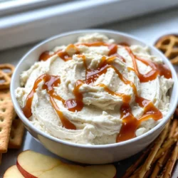 - 8 oz cream cheese, softened - 1 cup powdered sugar - 1/2 cup sour cream - 1 teaspoon vanilla extract - 1/2 cup salted caramel sauce - A pinch of sea salt - Dipping options: graham crackers, apple slices, or pretzels To make this salted caramel cheesecake dip, you need simple ingredients. First, you start with cream cheese. Make sure it is softened. This helps it mix well. Next, you will use powdered sugar. This adds sweetness and helps with texture. Sour cream adds creaminess and a slight tang. Vanilla extract gives the dip a lovely aroma. The salted caramel sauce is the star of the show. You can use store-bought or homemade. A pinch of sea salt enhances the caramel flavor. For dipping, I love using graham crackers, apple slices, or pretzels. Each option gives a unique taste and crunch. {{ingredient_image_1}} Start with 8 ounces of cream cheese. Make sure it is soft so it mixes well. In a large bowl, use an electric mixer. Beat the cream cheese until it is nice and smooth. This should take about 2 minutes. Next, slowly add in 1 cup of powdered sugar. Mix it well until you see no lumps. The cream cheese should be fluffy and sweet. Now, let’s add some more flavor. Pour in 1/2 cup of sour cream. Add 1 teaspoon of vanilla extract. Use the mixer again to blend everything. It should be well combined. Next, take 1/2 cup of salted caramel sauce. Drizzle it into the bowl, but save a couple of tablespoons for later. Use a spatula to fold it in gently. This creates a pretty marble effect. Be careful not to overmix it; we want swirls of caramel. To finish, sprinkle in a pinch of sea salt. This adds a nice contrast to the sweet dip. Taste it to see if you want more salt. Once it’s just right, transfer the dip to a nice serving bowl. Drizzle the reserved salted caramel sauce on top. For a final touch, sprinkle a bit more sea salt. This dip is now ready to serve! Enjoy it with graham crackers, apple slices, or pretzels. * To get a creamy dip, use room temperature cream cheese. * Cold cream cheese makes it hard to mix, so let it sit out. * Be gentle when mixing in the caramel. A few swirls make it pretty. * Overmixing can blend the layers too much, losing that marble look. * If you want more salt, add a pinch slowly. Taste after each addition. * To boost the caramel taste, try using a richer sauce. Homemade caramel works great. * You can add a bit of maple syrup for a unique twist. * Dippers like graham crackers, apple slices, and pretzels work best. * For a fun look, arrange the dippers around the dip in a circle. * Drizzle extra caramel on top and sprinkle sea salt for flair. * Use a colorful bowl to make the dip stand out at parties. Pro Tips Use Room Temperature Cream Cheese: Make sure your cream cheese is softened to room temperature for a smoother blending process, which will help eliminate lumps in your dip. Choose Quality Caramel Sauce: Whether store-bought or homemade, using a high-quality salted caramel sauce will significantly enhance the flavor of your dip. Adjust Sweetness to Taste: Feel free to adjust the amount of powdered sugar based on your preference for sweetness, especially if your caramel sauce is already quite sweet. Chill for Best Flavor: For a richer flavor, consider chilling the dip for 30 minutes before serving. This allows the flavors to meld beautifully. {{image_2}} You can easily change the flavors in your dip. Try adding chocolate for a rich twist. Mix in cocoa powder or melted chocolate. Fresh fruit can also add a tasty touch. Chopped strawberries or crushed raspberries work well. Another idea is to use flavored cream cheeses. Think of options like strawberry or hazelnut. This can give your dip a fun spin. If you want a lighter dip, swap some ingredients. Use light cream cheese instead of regular. You can also reduce the amount of sugar. Greek yogurt can replace sour cream for more protein. For a vegan version, use plant-based cream cheese. You can find many brands at your local store. Also, try making your salted caramel with coconut sugar. This makes a great alternative for everyone. Changing with the seasons can be fun! In fall, add pumpkin puree for a cozy vibe. A pinch of pumpkin spice will boost the flavor. During the holidays, try mint or peppermint extract. This adds a festive touch to your dip. You can even mix crushed candy canes into the dip. These small changes can make your dip special for any time of year. To keep your salted caramel cheesecake dip fresh, store it in an airtight container. This helps to prevent it from drying out. Place it in the fridge right after serving. It will stay good for about three to four days. Always check for any off smells before eating leftovers. You can serve this dip cold or warm. If you prefer it warm, gently heat it in the microwave. Use a low setting to avoid cooking it. Warm it for about 15-20 seconds. Stir it well to ensure even warmth. If you serve it cold, just scoop it straight from the fridge. Either way, it tastes delicious! Yes, you can use light cream cheese. It will make the dip a bit less rich. The taste will still be great, but the texture might be lighter. If you want a creamier dip, stick with regular cream cheese. To make homemade salted caramel, you need sugar, butter, and cream. Start by melting sugar in a pan until it turns golden brown. Then, add butter and stir until melted. Slowly pour in cream and mix well. Finally, add a pinch of sea salt. Let it cool before using in your dip. The dip will last about 3 to 5 days in the fridge. Make sure to store it in an airtight container. If it starts to look or smell off, it's best to throw it away. Yes, you can make this dip ahead of time. Just prepare it and store it in the fridge. It’s best to add the salted caramel drizzle just before serving. This keeps the dip looking fresh and tasty. This blog covered a tasty cream cheese dip. You learned about the key ingredients and how to mix them well. I shared tips for great texture and flavor. Explore different variations and healthier options. You can easily store any leftovers and enjoy them later. This dip is simple and fun for anyone. Dive into flavors and make it your own!